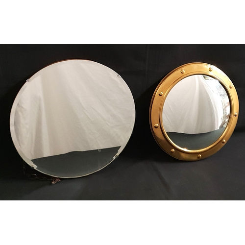 LINTON CONVEX BRASS MOUNTED WALL MIRROR
38cm diameter, with a round bevel edge 1930s wall mirror, 40cm diameter (2)