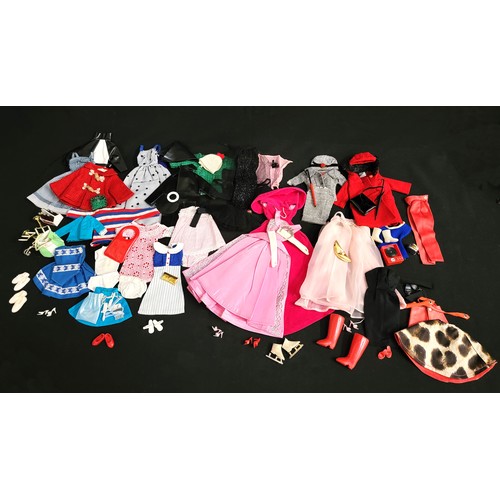 462 - A QUANTITY OF VINTAGE BARBIE OUTFITS
including Sophisticated Lady pink dress and over gown with tiar... 