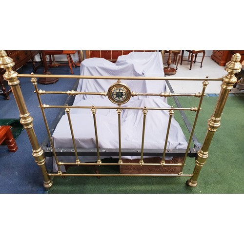 699 - PAIR OF VITORIAN BRASS BED ENDS
the footboard with mother of pearl decorated roundel detail, 140cm w... 