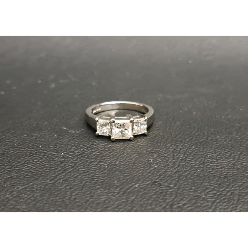 30 - PRINCESS CUT DIAMOND THREE STONE RING
the central diamond weighing approximately 0.5cts flanked by d... 