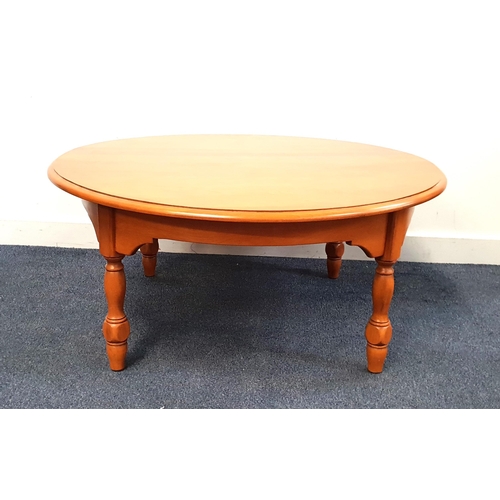 ROUND MAPLE LOUNGE TABLEE
on four turned legs, 90cm diameter x 42cm high