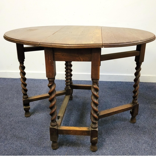 OAK DROP FLAP GATE LEG TABLE
with barley twist supports, the table top measuring 106 x 87cm, 76cm high