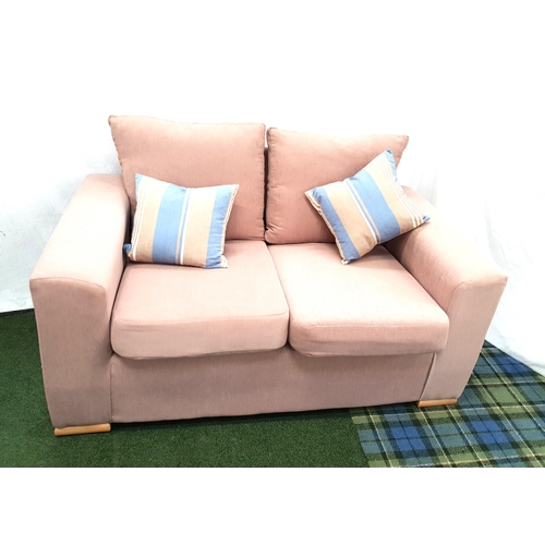 713 - CONTEMPORARY TWO SEAT SOFA
in mushroom textured fabric, with two scatter cushions 145 x 75 x 79 cm