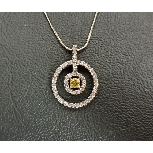 58 - ATTRACTIVE YELLOW AND WHITE DIAMOND SUITE OF EIGHTEEN CARAT WHITE GOLD JEWELLERY
comprising a pendan... 