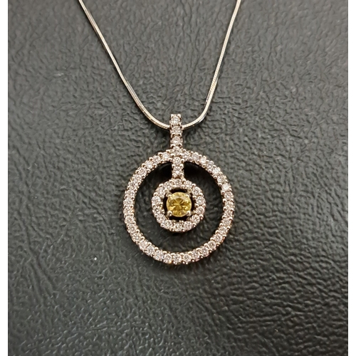 58 - ATTRACTIVE YELLOW AND WHITE DIAMOND SUITE OF EIGHTEEN CARAT WHITE GOLD JEWELLERY
comprising a pendan... 