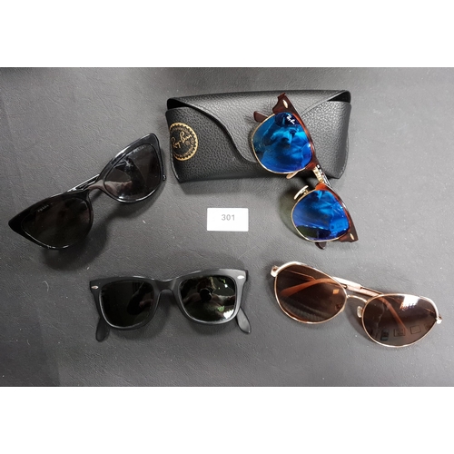 301 - FOUR PAIRS OF DESIGNER SUNGLASSES
comprising Prada, 2x Ray-Ban (one folding pair), and Kate Spade
No... 