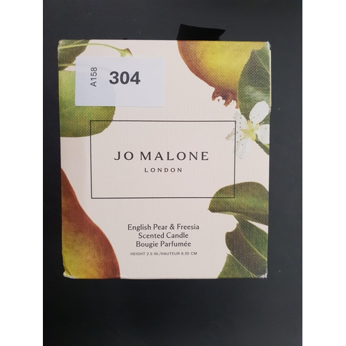 304 - NEW AND BOXED JO MALONE ENGLISH PEAR AND FREESIA SCENTED CANDLE
6.35cm high