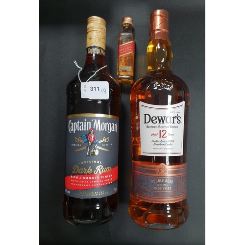 311 - TWO BOTTLES OF SPIRITS
comprising a bottle of Dewar's 12 year old blended Scotch Whisky (40% and 1L)... 