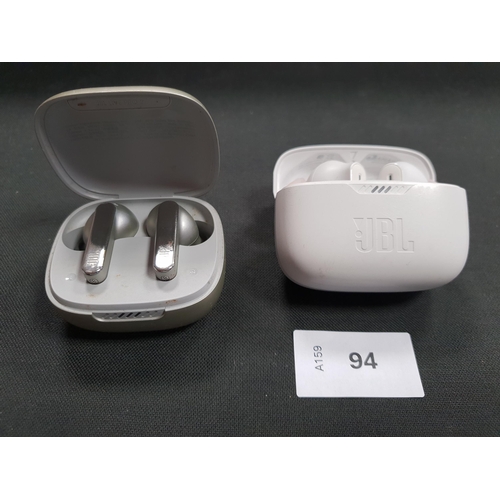 94 - TWO PAIRS OF JBL EARBUDS IN CHARGING CASES