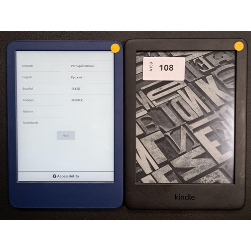 108 - TWO AMAZON KINDLE E-READERS
comprising a Basic 4, serial number G092 AQ03 2386 036X; and a Basic 3, ... 