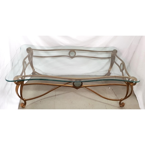 487 - GILT FINISHED WROUGHT IRON AND GLASS COFFEE TABLE
the shaped glass top above gilt wrought iron base ... 