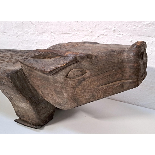 481 - FOLK ART HARDWOOD PIG BENCH / STOOL
with engraved pig heads to each side, atop two legs
122cm long, ... 