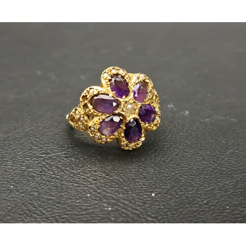 8 - AMETHYST AND SEED PEARL CLUSTER DRESS RING
the six oval cut amethysts surrounded by seed pearls, on ... 