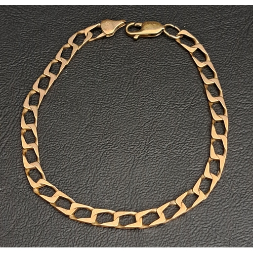 37 - NINE CARAT GOLD CURB LINK BRACELET
20.5cm long and approximately 6.7 grams