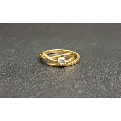 63 - DIAMOND SINGLE STONE RING
in attractive entwined eighteen carat gold setting, the diamond approximat... 