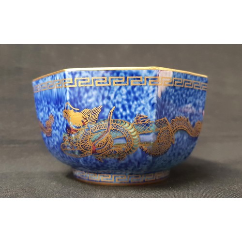 265 - SMALL WEDGWOOD FAIRYLAND LUSTRE BOWL BY DAISY MAKEIG-JONES
of octagonal shape on blue ground with gi... 