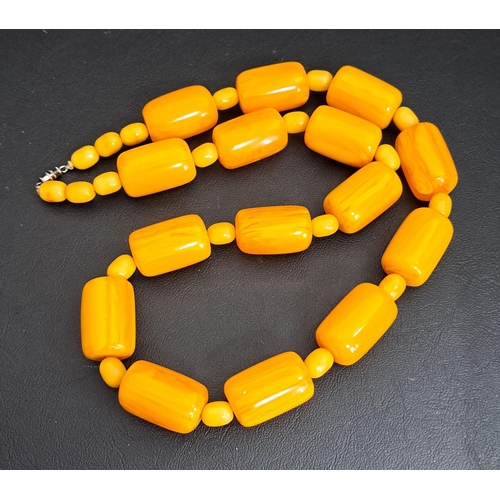 36 - BUTTERSCOTCH AMBER COLOURED BAKELITE BEAD NECKLACE
with alternating large and small beads, the large... 