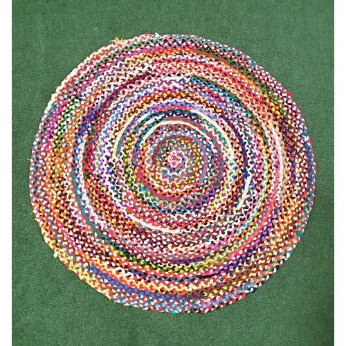 579 - ROUND RAG RUG
multicoloured with varying vibrant colours of rag, diameter approximately 155cm