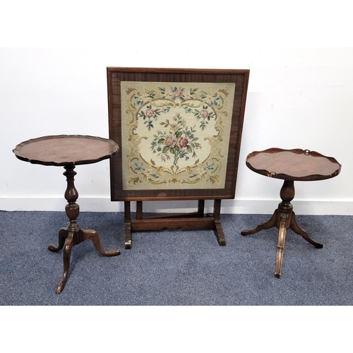 502 - MAHOGANY FRAMED FIRE SCREEN
with floral wool work in glass frame, screen converts into a table, with... 