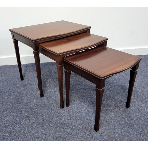 508 - MAHOGANY NEST OF TABLES
comprising three tables, each raised on tapered legs, the largest measuring ... 