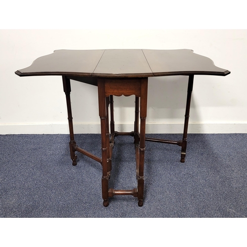 526 - MAHOGANY GATE LEG FOLD DOWN TABLE
with serpentine edge when extended, the legs turned, size when ext... 