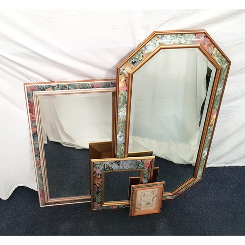 564 - THREE CUSHION FRAMED FLORAL DECORATED WALL MIRRORS
measuring 104cm x 51cm, 54cm x 77cm and 38cm x 33... 