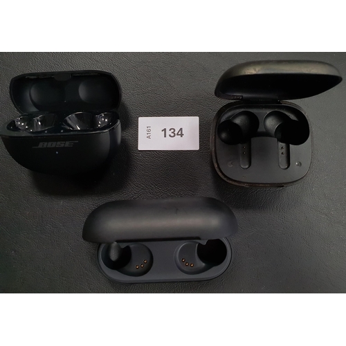 134 - THREE EMPTY EARBUD CHARGING CASES
comprising Bose, JBL and Sony