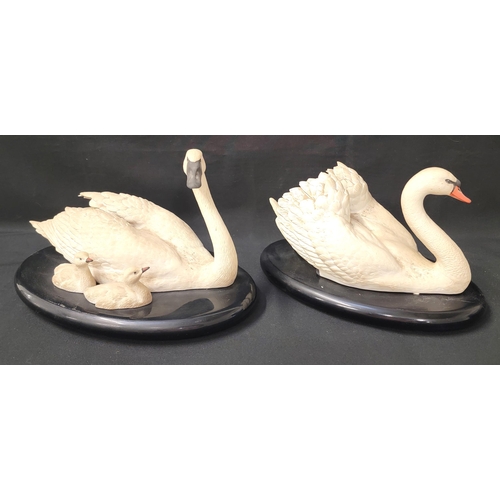 230 - TWO FRANKLIN MINT SWANS
consisting of 'Under her wing', 34cm long; 'Royal Swans', 30cm long, by Rona... 