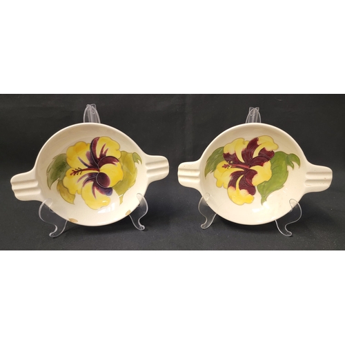 249 - PAIR OF MOORCROFT YELLOW HIBISCUS ASHTRAYS/ TRINKET BOWLS
one with label underside 'Moorcroft potter... 