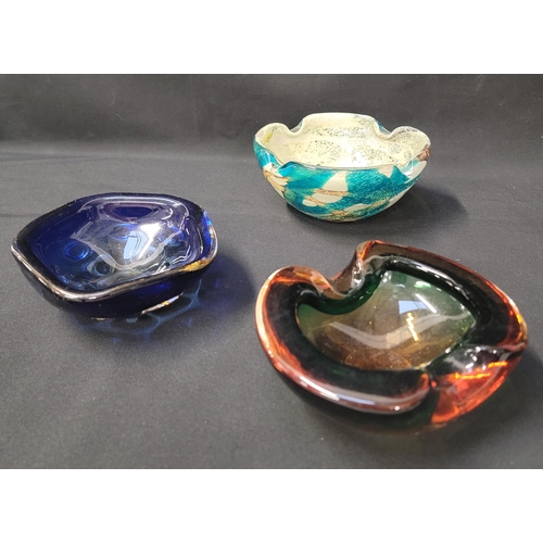 258 - THREE VINTAGE ART GLASS BOWlS
comprising a Mdina glass bowl, labelled underside, with undulating edg... 