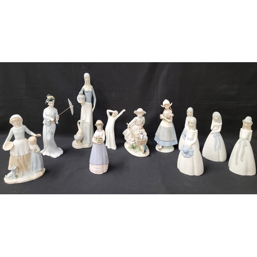 270 - LARGE SELECTION OF MIQUEL REQUENA FIGURINES
alongside other Spanish style figurines by St Michel and... 