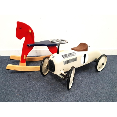 485 - VILAC WHITE RIDE ON TOY
with no. 1 to side, with chrome steering wheel, 70cm long; together with a w... 