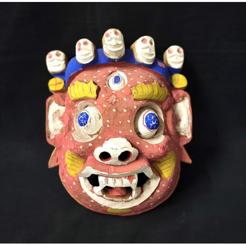 331 - COLOURFUL NEPALESE FACE MASK
circa 1960s, the carved wooden mask in colourful tones, 31.5cm high