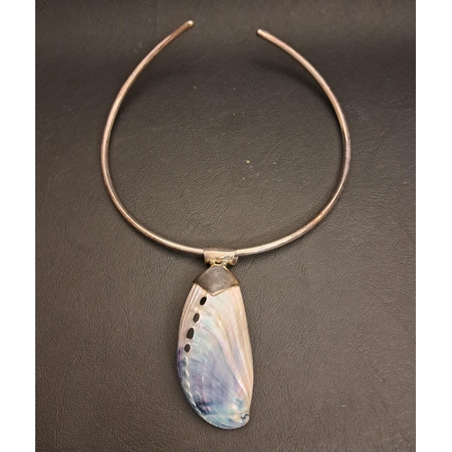 20 - UNUSUAL SILVER MOUNTED ABALONE SHELL PENDANT
by Shore Line Jewellers, on silver collar necklace, the... 