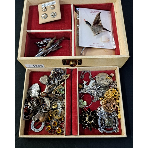 63 - ASSORTMENT OF VINTAGE COSTUME AND SILVER JEWELLERY
including silver locket, Norwegian silver brooch,... 