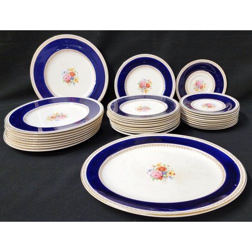 290 - CROWN DUCAL PART DINNER SERVICE
each with a colourful bouquet depicted to the centre, with a dark bl... 