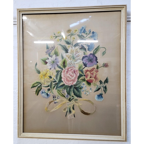 520 - EMROIDERED STILL LIFE ON SILK
of a bouquet of flowers, glazed and framed, 60 x 49cm