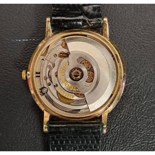 22 - GENTLEMENS ETERNA-MATIC CENTENAIRE NINE CARAT GOLD CASED WRISTEWATCH
the champagne dial with baton f... 