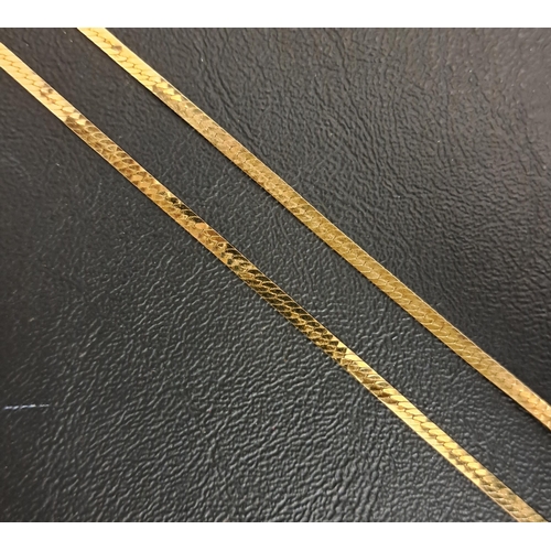 24 - FOURTEEN CARAT GOLD FLAT HERRINGBONE NECK CHAIN
50cm long and approximately 6.1 grams