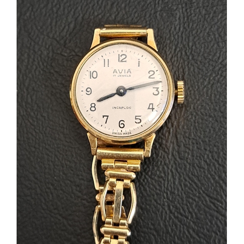 74 - LADIES AVIA NINE CARAT GOLD CASED WRISTWATCH
the dial with Arabic numerals, with 17 jewels movement,... 