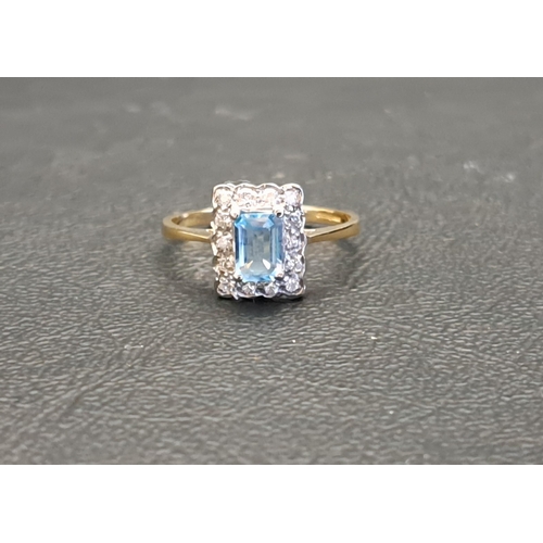 80 - BLUE TOPAZ AND DIAMOND CLUSTER RING
the emerald cut topaz approximately 0.5cts in fourteen diamond s... 