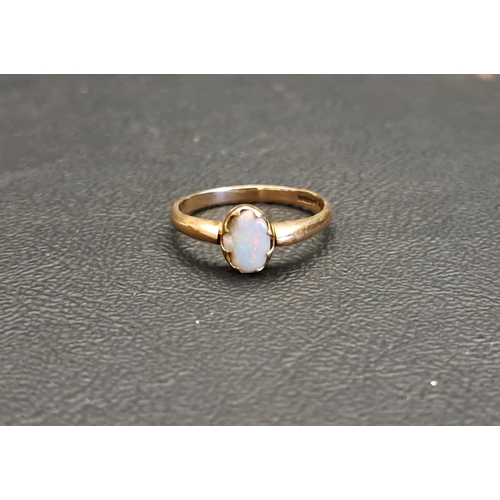 115 - OPAL SINGLE STONE RING
on nine carat gold shank, ring size L-M and approximately 1.8 grams