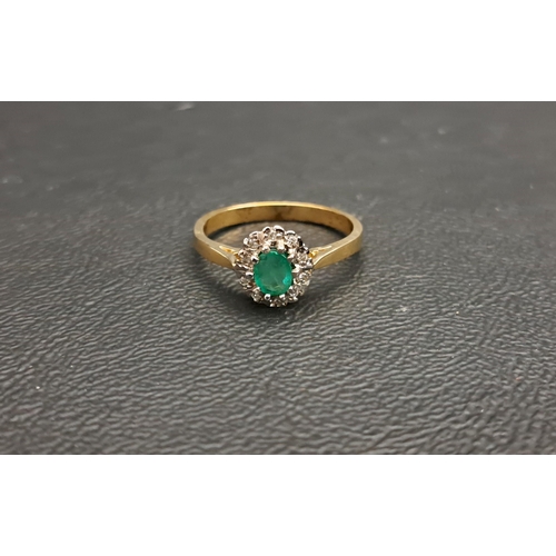 116 - EMERALD AND DIAMOND CLUSTER RING
the central oval cut emerald approximately 0.3cts in ten diamond se... 