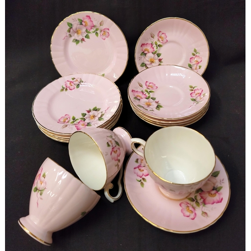 291 - ROYAL GRAFTON TEASET
decorated with flowers on a light pink ground, comprising six cups, saucers and... 