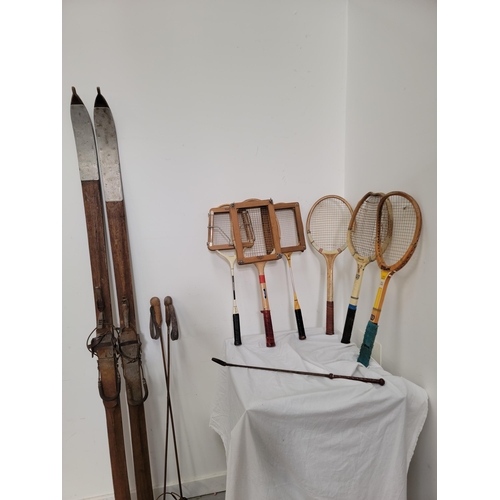 392 - SELECTION OF VINTAGE SPORTS EQUIPMENT
comprising four tennis rackets and two squash rackets, all woo... 