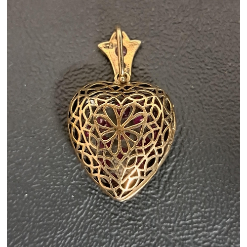 42 - VICTORIAN STYLE RUBY AND DIAMOND HEART SHAPED LOCKET PENDANT
the multiple rubies ranging in size fro... 