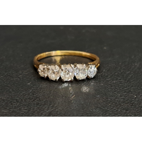 31 - IMPRESSIVE GRADUATED DIAMOND FIVE STONE RING
the largest central diamond approximately 0.35cts, in a... 