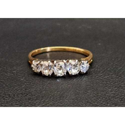 31 - IMPRESSIVE GRADUATED DIAMOND FIVE STONE RING
the largest central diamond approximately 0.35cts, in a... 