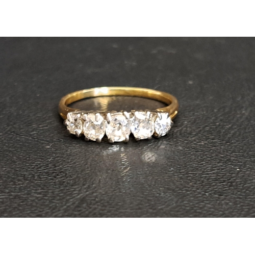 31 - IMPRESSIVE GRADUATED DIAMOND FIVE STONE RING
the largest central diamond approximately 0.35cts, in a... 