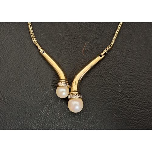 34 - PEARL AND DIAMOND SET NINE CARAT GOLD NECKLACE
the front section formed with two pearls below illusi... 